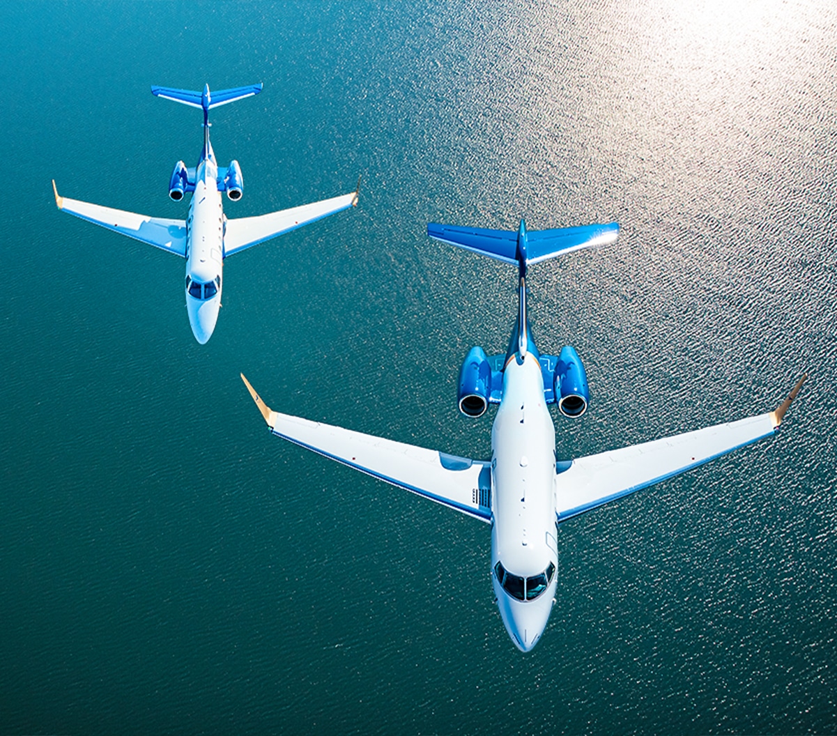 Airshare's Challenger 3500 and Phenom 300E flying over the Florida Keys