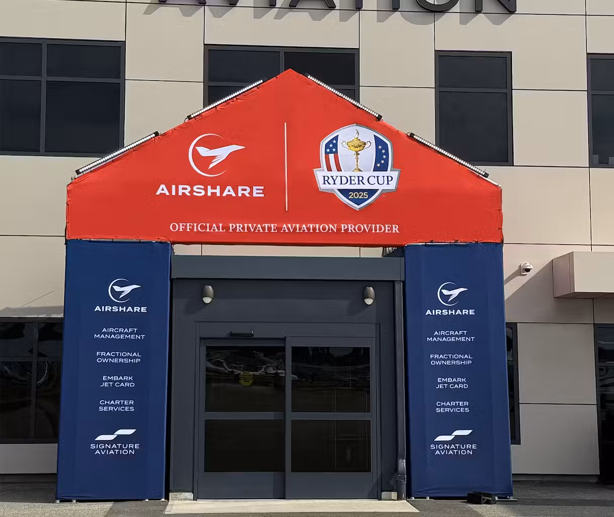 Airshare's joint Signature Aviation FBO in Teterboro, NJ with Ryder Cup Partnership activation archway on doorway ramp.